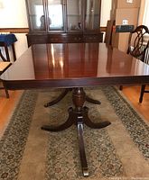 Full view of rectangular table top and twin pedestal bases