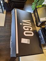 Closed Vigo branded box on tabletop