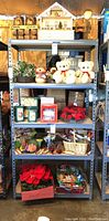 Front view of heavy-duty metal rack fully loaded with various items including teddy bears, holiday decorations and baskets to demonstrate shelf use.