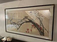 Full view of framed cherry blossom painting with birds
