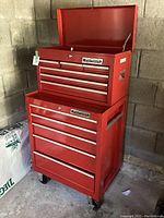 Front view of entire unit with top chest open and bottom cabinet visible