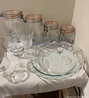 Full set showcasing all items: pie plate with lid, canisters, and stemware
