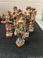 Photo showing the front view of the five Boyds Bears and Friends figurines arranged in a line.