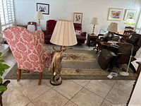 Full room view showing the rug with surrounding furniture and overall design and color.