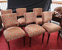 Six chairs arranged in two rows showing front and side profile