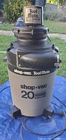Front view of the Tool Mate 20 gallon shop vac showing the tank and motor housing.