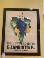 Front view of framed poster showing fruit illustration and French text