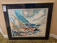 Full view of framed serigraph over nautical map showing sailboat scene