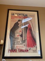 Full-view of the framed poster showing artwork, frame style and size