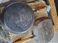 Bottom view of round cast iron skillet showing Findlay brand and No. 60 marking