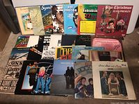 Overview of 20 LP record albums showing a variety of album covers from classic rock, folk, and pop artists.