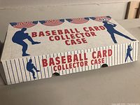 Closed white cardboard collector case with blue and red text saying 'Baseball Card Collector Case'.