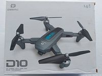 Front of box showing DEERC D10 drone with four propellers and camera, indicating age 14+ and HD camera with WiFi and remote transmitter.