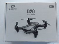 Original retail box front showing DEERC D20 HD Camera drone branding and 14+ recommended age label