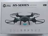 Box front of the Holy Stone HS-Series HS110D FPV drone showing model and features including 120° wide-angle 1080P HD WiFi camera, suitable for ages 14+.