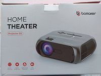 Boxed Bomaker Home Theater Projector S5 showing front lens, brand, and feature labels.