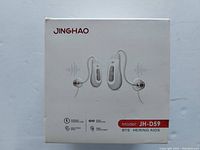Front of box showing image of JINGHAO hearing aids model JH-D59, highlighting features like optimal volume, noise reduction, and fading adjustment.