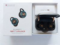 Box, charging case with wireless earbuds inside, and instruction booklet for Monster Clarity 101 Airlinks headphones.