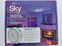 Image of the BlissLights Sky Lite Galaxy Projector in its original packaging highlighting product features