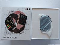 Front of the box showing the IPS smart watch and the watch unit inside packaging.