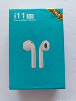 Front view of turquoise retail box showing product name i11 5.0 True wireless headset and picture of earbuds.