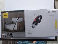 Boxed ST-6608EG multifunction cordless vacuum cleaner by Zuolin showing product on packaging with images of stick and handheld vacuum modes.