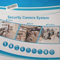 Packaging showing system capabilities and use cases for home, store, and factory. Icons illustrate system features like motion detection, remote access, audio, VGA, HD output, network, IR-cut, and 4 in 1 functionality.