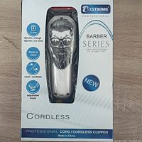 Single boxed ESTBOMG professional cordless clipper visible through package window showing skull with beard artwork.