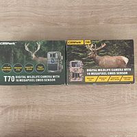 Front view of two Campark wildlife camera boxes, models T70 and T40, showing product images and main specifications.