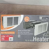 Front of the box showing brand King, model PAW 1215, vent heater image and key features.