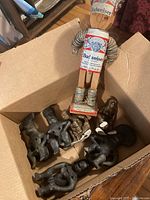 Box overview showing all seven figurines