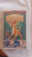 Single VHS tape in plastic case with colorful Bambi cover art labeled as 55th Anniversary Limited Edition, fully restored.