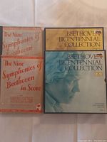 Four books/scores of Beethoven symphonies and related works including The Nine Symphonies of Beethoven in Score and Beethoven Bicentennial Collection volumes