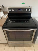 Front view of range showing cooktop, oven door, and control panel