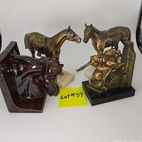 Front and side view of metal horse pair on onyx bases, MCM ceramic horse head, Roman-style metal horse and rider bookends with yellow lot tag