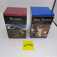 Two boxed sets in slipcases: the burgundy Brontë Collection set and the blue Jane Austen Collection set with a yellow note labeled Lot#96.