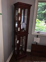 Full view of cabinet showing overall height, shape and finish