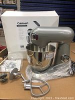 Front view of mixer body, bowl, attachments and box