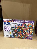 Front of box showing Build'n Blox 500 pcs, 12 amazing colors, for ages 4+