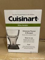 Front view of the Cuisinart Wine Aerator box featuring brand name, product image, and product benefits including flavor enhancement, ease of use, and fast aeration.