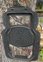 Front view of one black textured rubber and camouflage Browning truck floor mat showing embossed logo