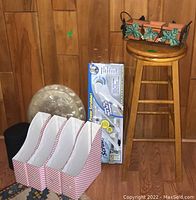Full lot photo showing wooden stool, magazine organizers, Turbo Scrub box, and toilet seat.