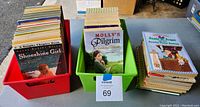 Three containers and a stack of beginning chapter books for grades 1 through 3, including visible titles 'Shoeshine Girl,' 'Molly's Pilgrim,' and 'Judy Moody and Friends.'