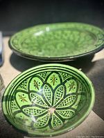 Photo showing the large green salad bowl and small green bowl with hand-painted floral design.
