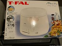 Front of the T-FAL Maxi-Fry Deep Fryer box showing the fryer image and branding.
