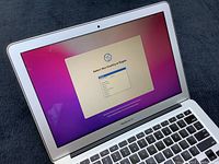 MacBook Air open showing region selection screen