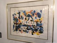 Front view of framed mixed media abstract artwork showing vibrant colors and Jan Paulus-Maly signature.