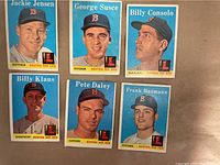 Photo of six 1959 Topps Boston Red Sox baseball cards showing player portraits and team info with blue backgrounds