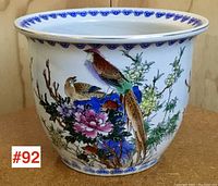 Front view showing bird and peony scene