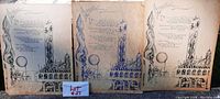 Eight cardstock art drawings arranged in groups of three or more, showing fragile edges, unusual architectural and balloon illustrations, and integrated poetry text.